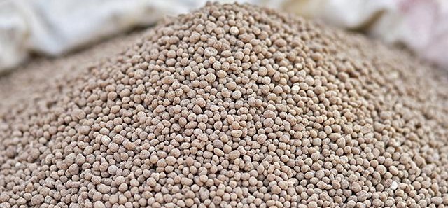 Pile of granular fertilizer for agriculture use.