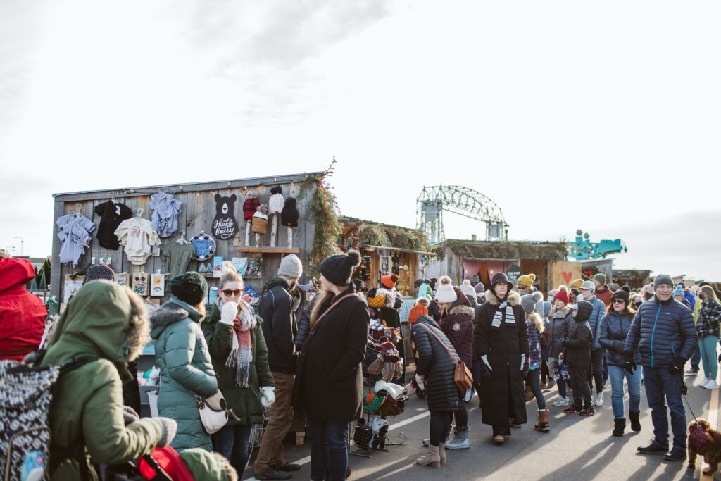 Events 8 Crowded duluth winter market with the aerial lift bridge in the background